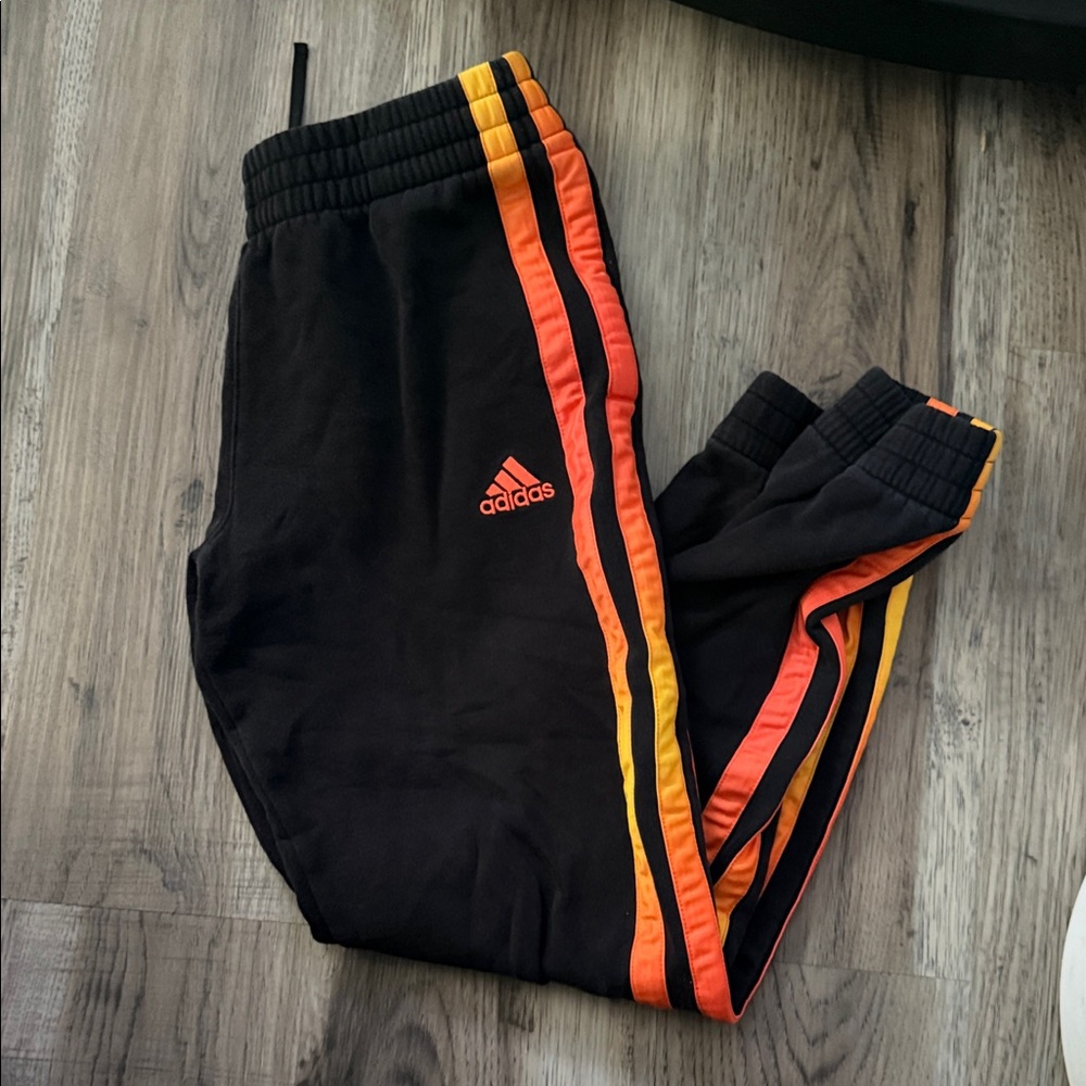 Adidas Kids Black Sweatpants with Red and Yellow Accents